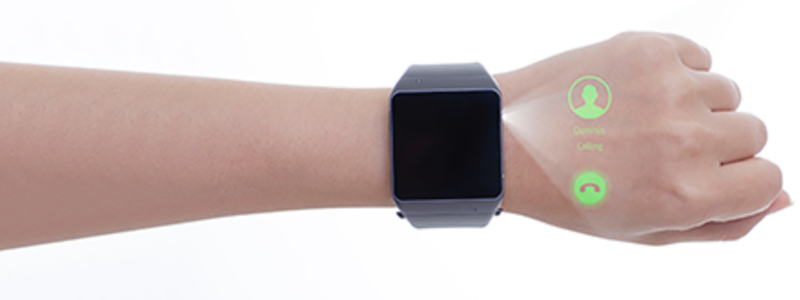 Illustration for article titled Este smartwatch que proyecta películas es una idea tan descabellada como suena